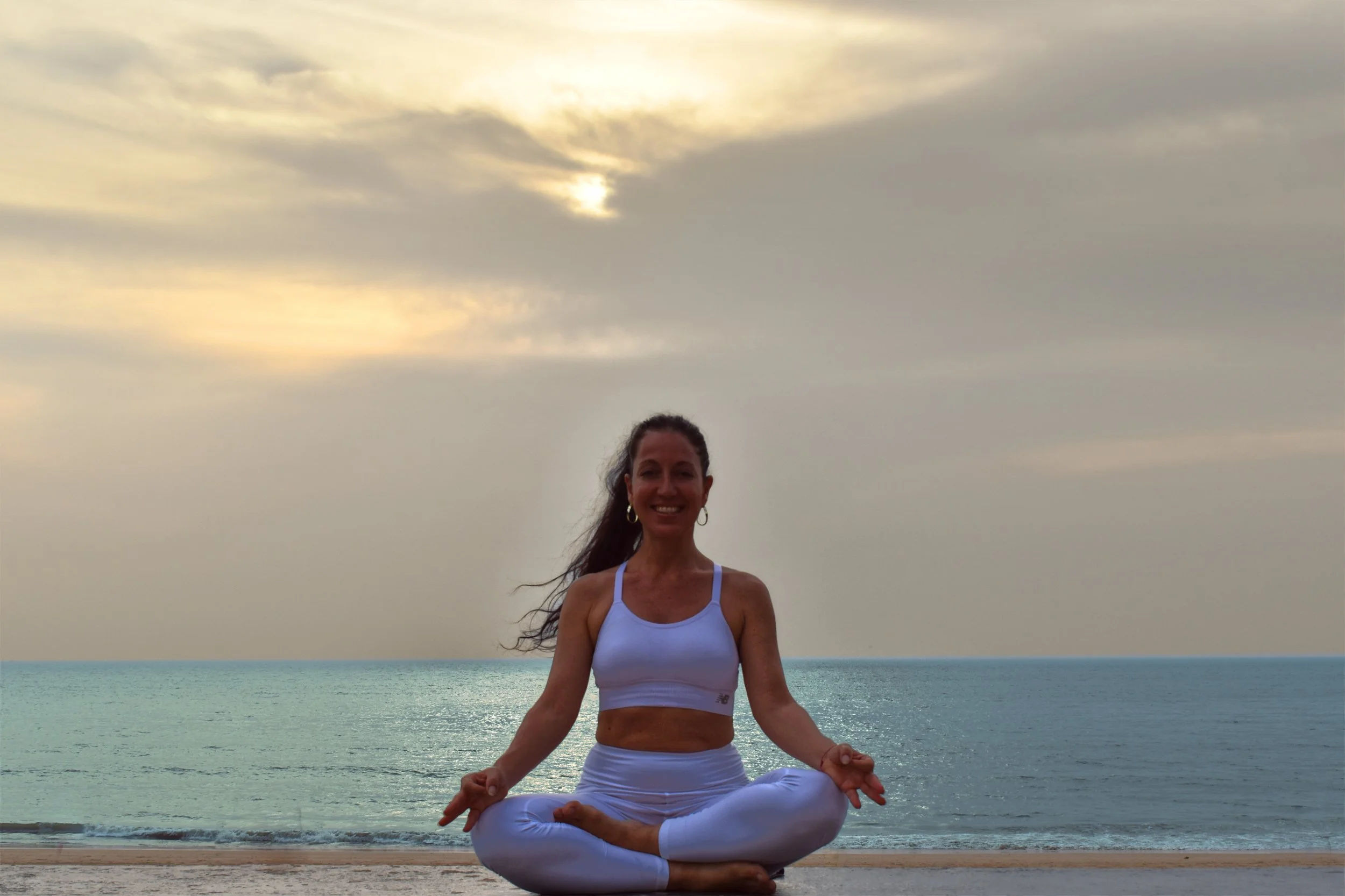 Annamaria yoga beach pose